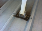 Tilt frame poorly positioned causing water penetration of metal roof